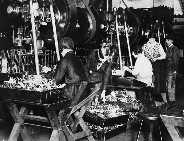 The stamping workshop in a Birmingham motorcycle factory. Circa 1938