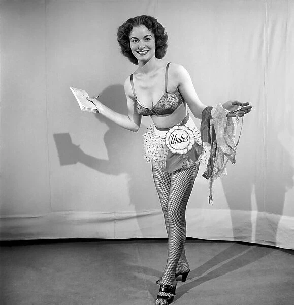 Woman modelling underwear in the Reveille Studio. 1966