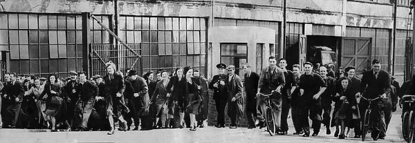 The workforce at BSA in Small Heath Birmingham pour out of the factory gates at