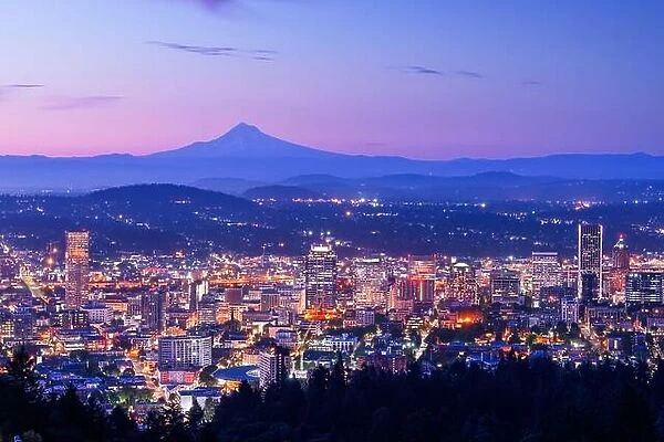 Portland, Oregon, USA skyline at dawn with Mt. Hood in the distance at dawn