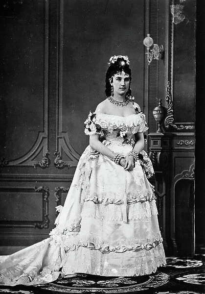 Portrait of young woman in evening dress