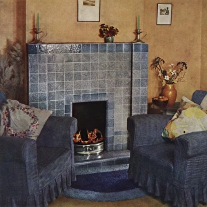 1930s living room with fireplace and chairs