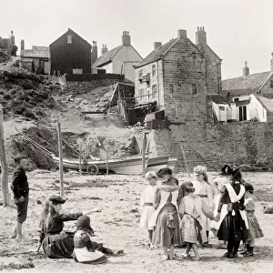 Children on the beach, Robin Hoods Bay, Yorkshire