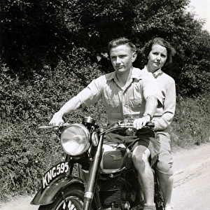 Couple on a 152 BSA motorcycle