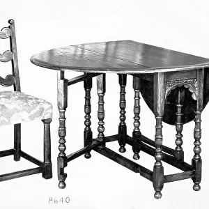 A drop-leaf table and chair
