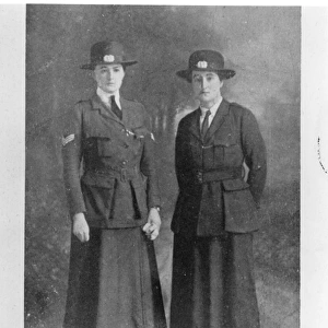 Two early women police officers in uniform