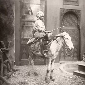 Egyptian boy on a donkey, Egypt, c. 1890