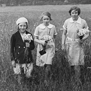 Three girls with flowers, Box Hill 1936
