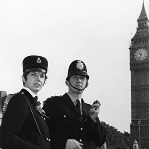 Male and female police officers in Westminster, London