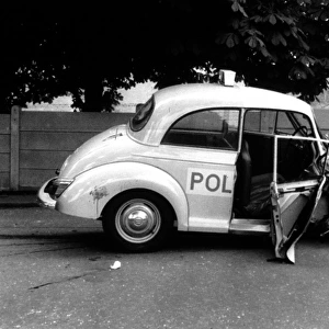 Metropolitan Police car with smashed bonnet