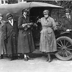 Police sergeant with women in military uniform, WW1