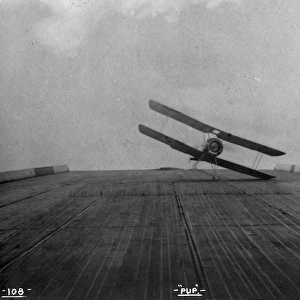 A Sopwith Pup with early arrester gear during deck-landing