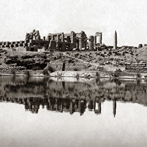 View of the temple and sacred lake, Karnak, Egypt, circa 188