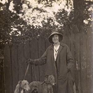 Woman and dogs in garden