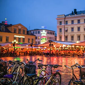 Sweden, Linkoping, cafes and bars on Stora target square, dusk Date: 18-05-2019