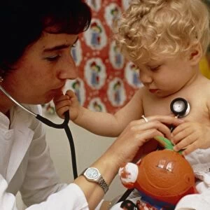 Pediatrician with infant