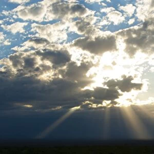 Beams of sunlight shine down to earth, Catamarca, Argentina, South America