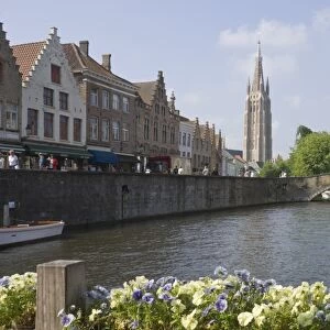 Canal view with the spire of the Church of our Lady, Brugge, Belgium, Europe