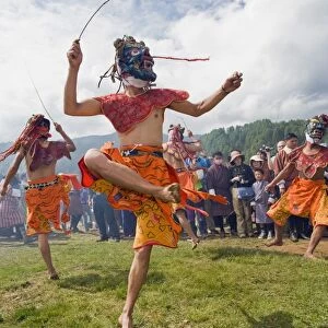 Dancers in costume at Thangbi Mani Tsechu (festival), Jakar, Bumthang, Chokor Valley