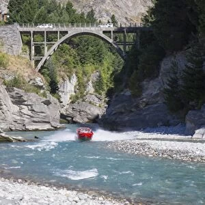 Jet boat on the Shotover River below the Edith Cavell Bridge, Queenstown, Queenstown-Lakes district