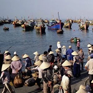 People from fishing village collecting the morning