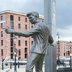Statue by Tom Murphy of singer songwriter Billy Fury, near Albert Dock