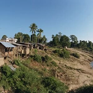 Stilt houses along the bank of the Xe Beng Fai River