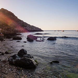 Sunstar at Isola Bella Beach at sunrise, Taormina, Sicily, Italy, Mediterranean, Europe