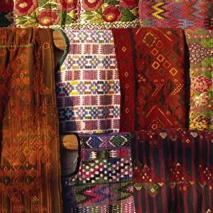 Traditional woven huipiles in the market, Chichicastenango, Quiche Highlands