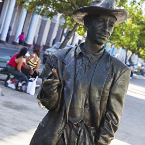 Cuba, Cienfuegos Province, Cienfuegos, Paseo del Prado, statue of world-famous local