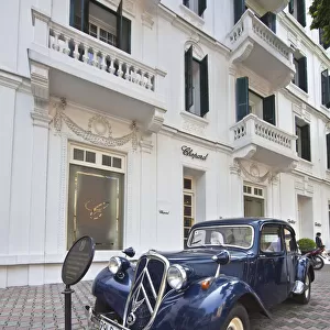 Old Citroen car outside the Sofitel Metropole Legend Hotel, Hanoi, Vietnam