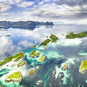 Small idyllic islands of Bergsoyan along the fjord, aerial view, Hamn I Senja, Skaland