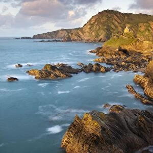 St Nicholas Chapel and Beacon Point on the rocky coast of Ilfracombe, Devon, England