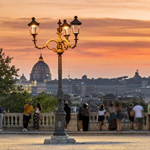 View over St. Peters Basilica at sunset from Pincio terrace, Rome, Lazio, Italy
