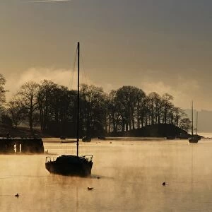 Lake Windermere at dawn in the Lake District UK