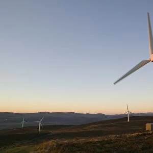 A wind farm looking towasrds the Coniston fells in the Lake district UK