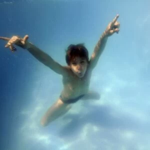 Young boy having underwater fun in the family pool, Guararema, Sao Paulo, Brazil (rr)