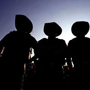 Cowboys are silhouetted during the Barretos Rodeo International Festival in Barretos