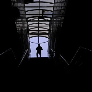 A man walks along a staircase in a pedestrian tunnel in Moscow