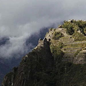 The peak of Huayna Picchu, the mountain rising above the Inca citadel of Machu Picchu