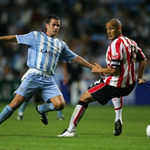 Michael Doyle of Coventry City Outwits Nigel Quashie with a Clever Pass (2005)