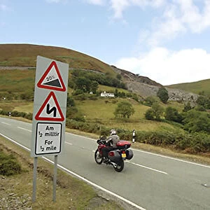 Motorbike on steep hill in Wales Wales