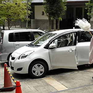 Shinto priest blessing car Nara