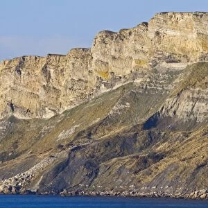 View of sea cliffs with folding of rocks, near Kimmeridge, Dorset, England, december