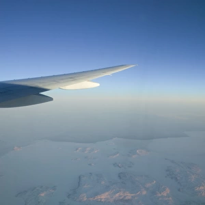 CANADA, Northwest Territories. Aerial View of Hudson Bay in winter on flight to China