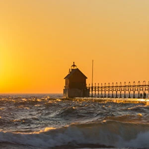 Grand Haven South Pier Lighthouse at sunset on Lake Michigan, Ottawa County, Grand Haven