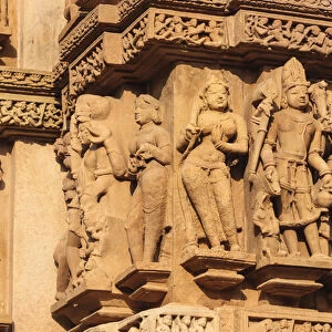 India, Madhya Pradesh, Chhatarpur District, Khajuraho, Detail of yaksha and yakshi