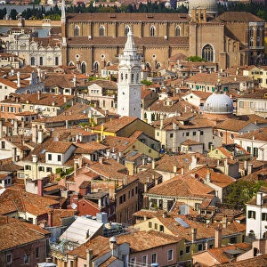 Tile roof tops and leaning bell tower of Santa Maria Formosa church from the Campanile San Marco