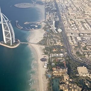 UAE, Dubai. Aerial image of Burj al Arab Hotel and surrounding neighborhood