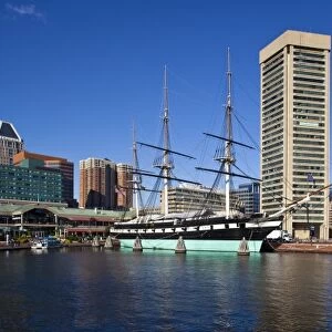 USA, Maryland, Baltimore. Inner Harbor, Harborplace Mall and USS Constellation, historic ship
